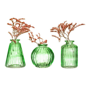 Three green bud vases with flowers 